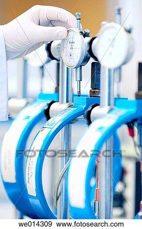 Stock Photo - Mechanical traction test, mechanical characterization laboratory. Fotosearch