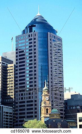 Old clock tower contrasts with modern buildings in Central Business District, Sydney, Australia View Large Photo Image Stock Photo - Old clock tower contrasts with modern buildings in Central Business District, Sydney, Australia. Fotosearch
