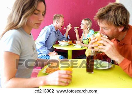 People eating View Large Photo Image Stock Image - People eating. Fotosearch