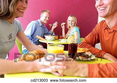 People eating View Large Photo Image Stock Image - People eating. Fotosearch
