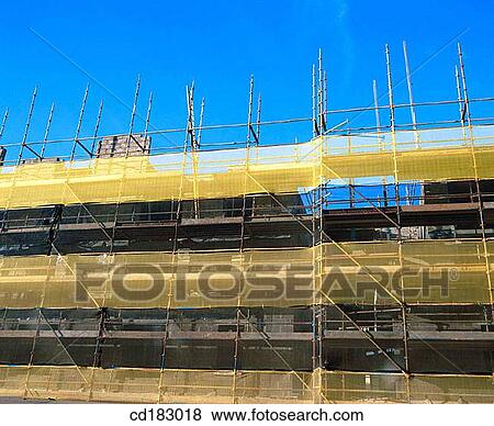 Scaffolding. Block of flats under construction View Large Photo Image Stock Photo - Scaffolding. Block of flats under construction. Fotosearch