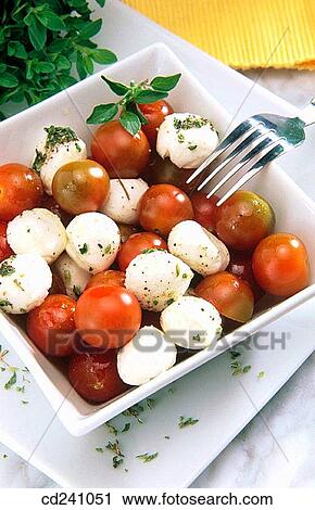 Tomatoes and mozzarella View Large Photo Image Stock Image - Tomatoes and mozzarella. Fotosearch