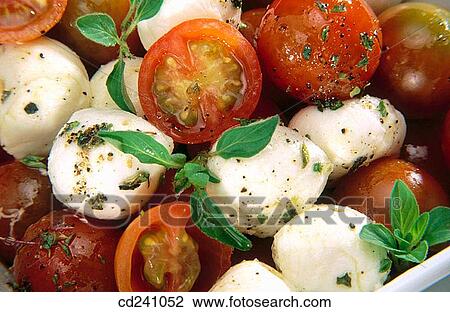 Tomatoes and mozzarella View Large Photo Image Stock Image - Tomatoes and mozzarella. Fotosearch