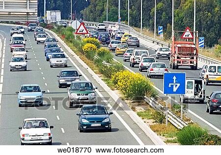 Traffic on motorway near Torremolinos. Costa del Sol, Mßlaga province, Spain View Large Photo Image Stock Image - Traffic on motorway near Torremolinos. Costa del Sol, Mßlaga province, Spain. Fotosearch