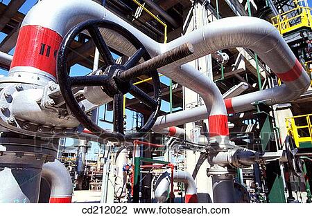 Stock Image - Valves at Repsol-YPF oil refinery. Tarragona province. Spain. Fotosearch