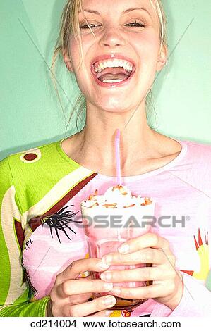 Woman eating ice-cream View Large Photo Image Picture - Woman eating ice-cream. Fotosearch