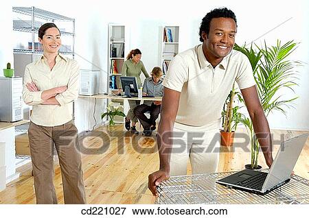 Workteam in office View Large Photo Image Stock Photo - Workteam in office. Fotosearch