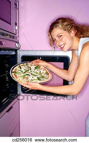 Stock Photograph - 30's, at-home, 20's. Fotosearch