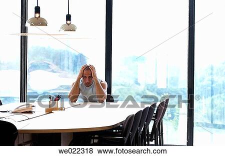 Stock Photo - 30's, business, absorbed, 20's. Fotosearch