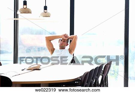 Stock Photo - 30's, business, absorbed, 20's. Fotosearch