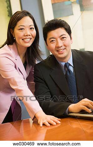 Stock Photo - 30's, businessman, business, Asian, 20's. Fotosearch