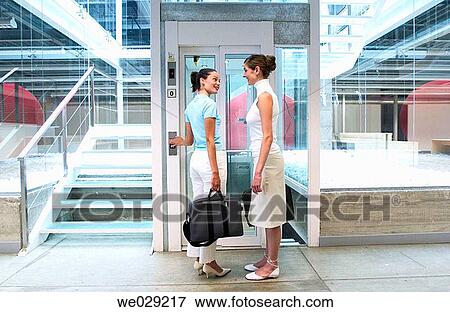 Stock Photo - 30's, businesspeople, business, briefcase, 20's. Fotosearch