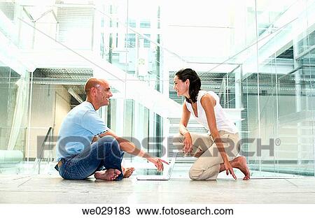 Stock Image - 30's, businesspeople, businessman, business, 20's. Fotosearch