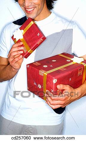 Stock Image - 30's, carrying, carry, 20's. Fotosearch