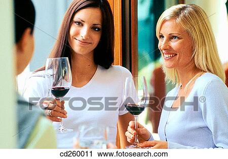 Stock Image - 30's, chat, 20's. Fotosearch