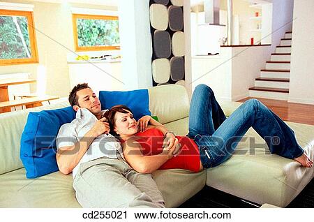 30's, chilling out, at-home, affection, 20's View Large Photo Image Stock Image - 30's, chilling out, at-home, affection, 20's. Fotosearch
