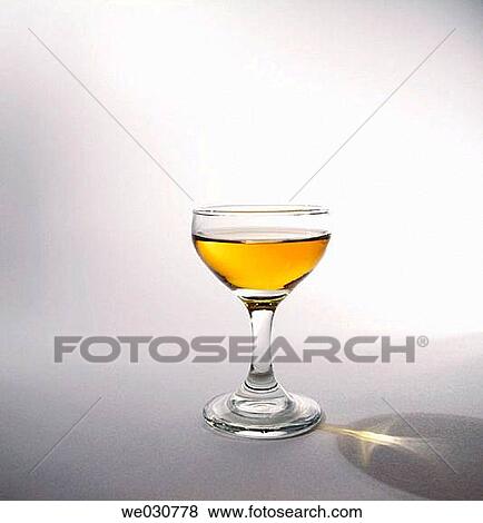 A glass of Calvados View Large Photo Image Stock Photo - A glass of Calvados. Fotosearch