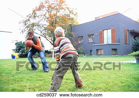 Stock Photo - ability, ball, amusement, activity, 30's. Fotosearch