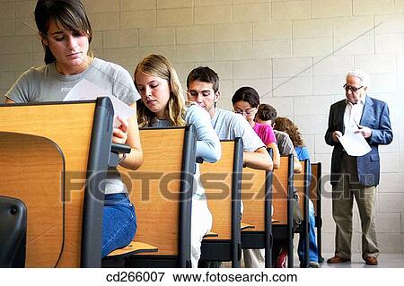 Stock Photo - aged, classroom, boy, adolescence. Fotosearch