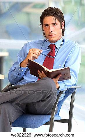 agenda, businesspeople, businessman, business, 30's View Large Photo Image Stock Photograph - agenda, businesspeople, businessman, business, 30's. Fotosearch