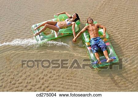 air-bed, calm, beach, air mattress View Large Photo Image Picture - air-bed, calm, beach, air mattress. Fotosearch
