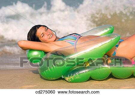 air-bed, calm, brunette, beach, air mattress View Large Photo Image Stock Image - air-bed, calm, brunette, beach, air mattress. Fotosearch