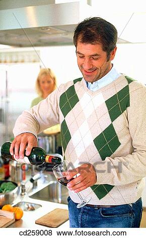 alcohol, bottle, at-home, Alcoholic drink, 30's View Large Photo Image Stock Photo - alcohol, bottle, at-home, Alcoholic drink, 30's. Fotosearch