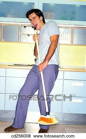 amusing, brush, broom, 20's View Large Photo Image Stock Photo - amusing, brush, broom, 20's. Fotosearch
