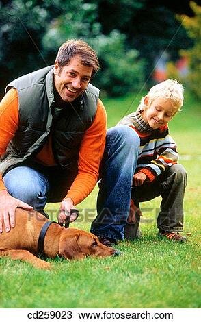 animal, caressing, caress, boy, 30's View Large Photo Image Stock Image - animal, caressing, caress, boy, 30's. Fotosearch