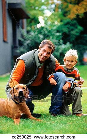 animal, caressing, caress, boy, 30's View Large Photo Image Stock Photography - animal, caressing, caress, boy, 30's. Fotosearch