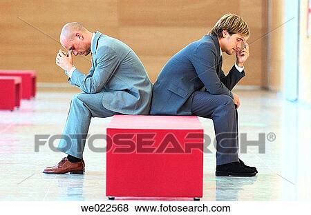 Stock Photo - appointment, businessman, business, bench, absorbed. Fotosearch