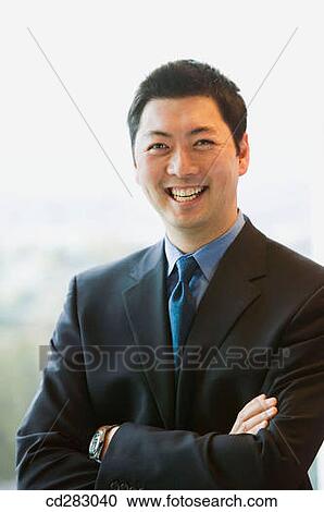 arms folded, businessman, business, Asian, Arms crossed View Large Photo Image Stock Image - arms folded, businessman, business, Asian, Arms crossed. Fotosearch