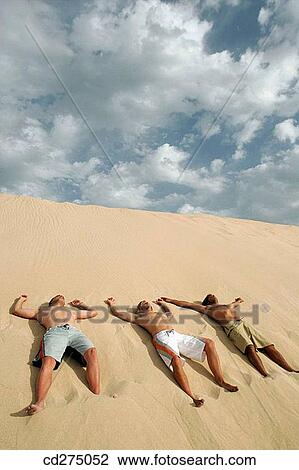 Arms open, beach, bask, Arms raised, 20's View Large Photo Image Stock Image - Arms open, beach, bask, Arms raised, 20's. Fotosearch