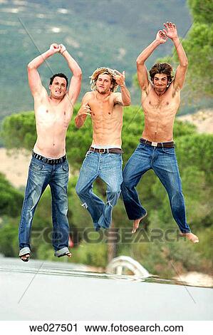 Arms raised, barefoot, 20's View Large Photo Image Stock Image - Arms raised, barefoot, 20's. Fotosearch