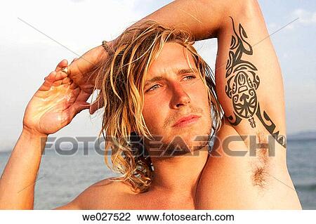 Arms raised, beach, absorbed View Large Photo Image Stock Image - Arms raised, beach, absorbed. Fotosearch