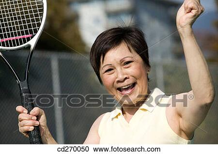 Arms raised, champion, Asian, achievement View Large Photo Image Stock Image - Arms raised, champion, Asian, achievement. Fotosearch