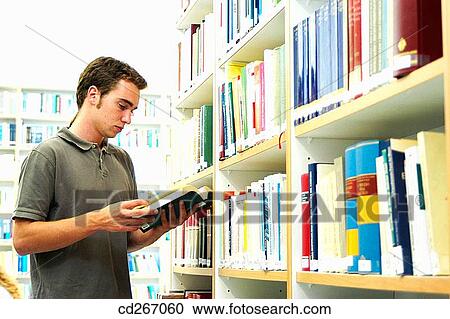 arrangement, boy, bookcase, book, adolescence View Large Photo Image Stock Image - arrangement, boy, bookcase, book, adolescence. Fotosearch
