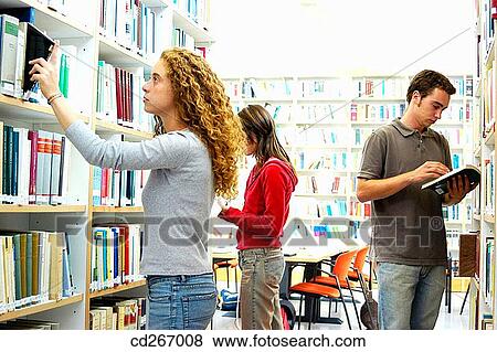 arrangement, boy, bookcase, book, adolescence View Large Photo Image Stock Photo - arrangement, boy, bookcase, book, adolescence. Fotosearch