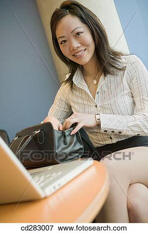 Stock Photo - Asian, break-time, break, bag, 20's. Fotosearch