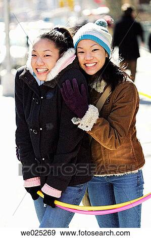 Asian teenage girls twins View Large Photo Image Stock Photo - Asian teenage girls twins. Fotosearch