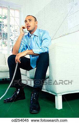 Stock Photography - at-home, calling, blue eyes, activity. Fotosearch