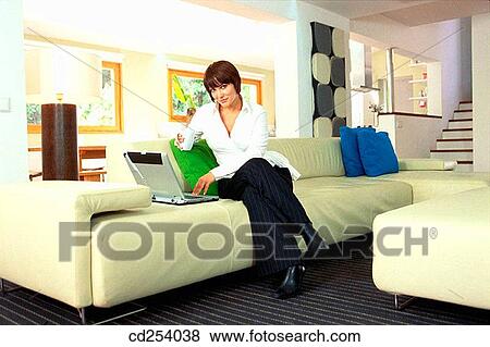 Stock Photo - at-home, calm, businesswoman, businesspeople, 20's. Fotosearch