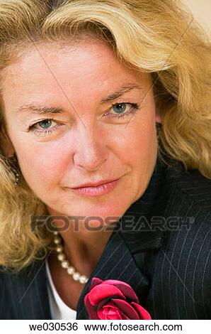 Stock Photograph - baby boomer, blond, blue eyes, business, businesspeople. Fotosearch