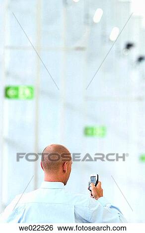 Stock Photograph - back view, business, businessman, businesspeople. Fotosearch