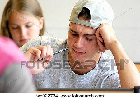 Ball-point pen, cap, boy, adolescence View Large Photo Image Picture - Ball-point pen, cap, boy, adolescence. Fotosearch
