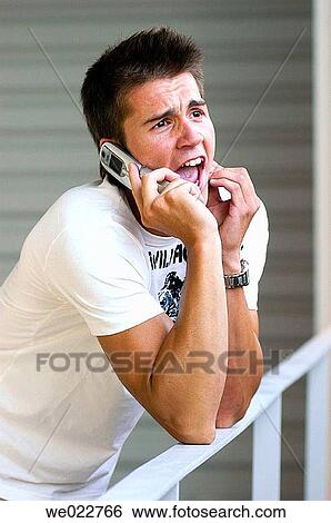 bannister, cell phone, boy, adolescence View Large Photo Image Stock Photograph - bannister, cell phone, boy, adolescence. Fotosearch