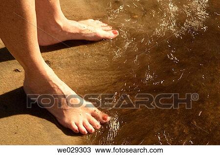 Stock Image - barefoot, coastal, coast, beach, anonymous. Fotosearch