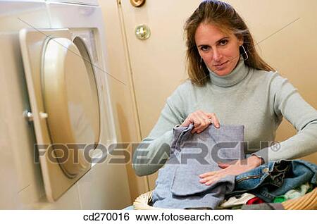 Stock Photograph - basket, clothes, contemporary. Fotosearch