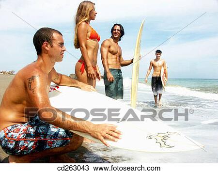 Stock Image - beach, boy, board, 20's. Fotosearch