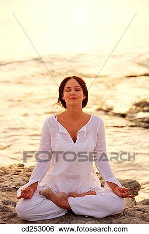 Stock Photograph - beach, brunette, calm, coast. Fotosearch